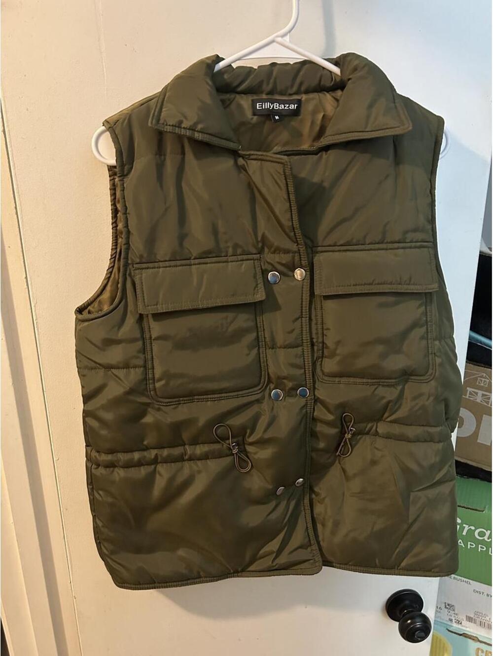 Brand new Eilley Bazar olive green puffer vest with pockets size M